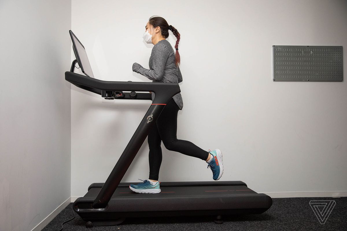 Woman running on Peloton Tread