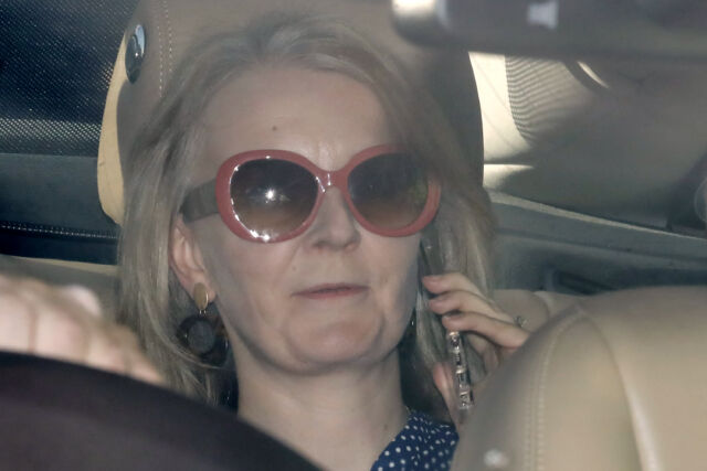 LIz Truss speaks on her phone on September 25, 2019.