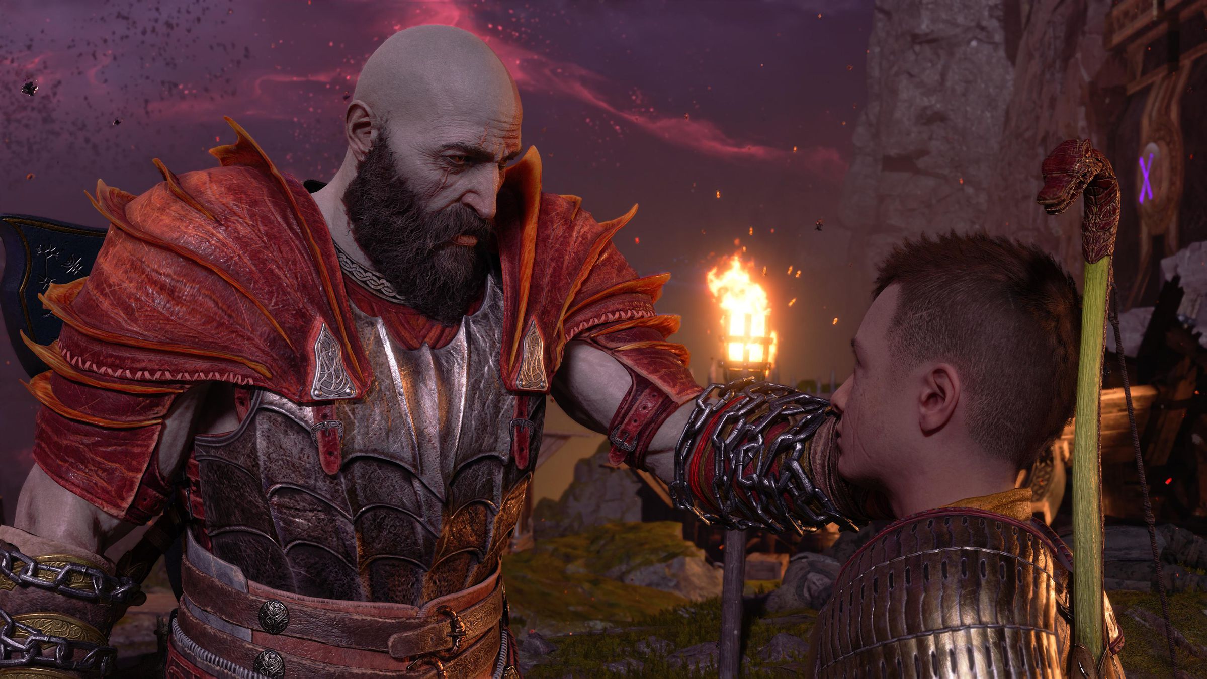 Screenshot from God of War Ragnarök featuring Kratos gently touching the face of his son, Atreus, in comfort