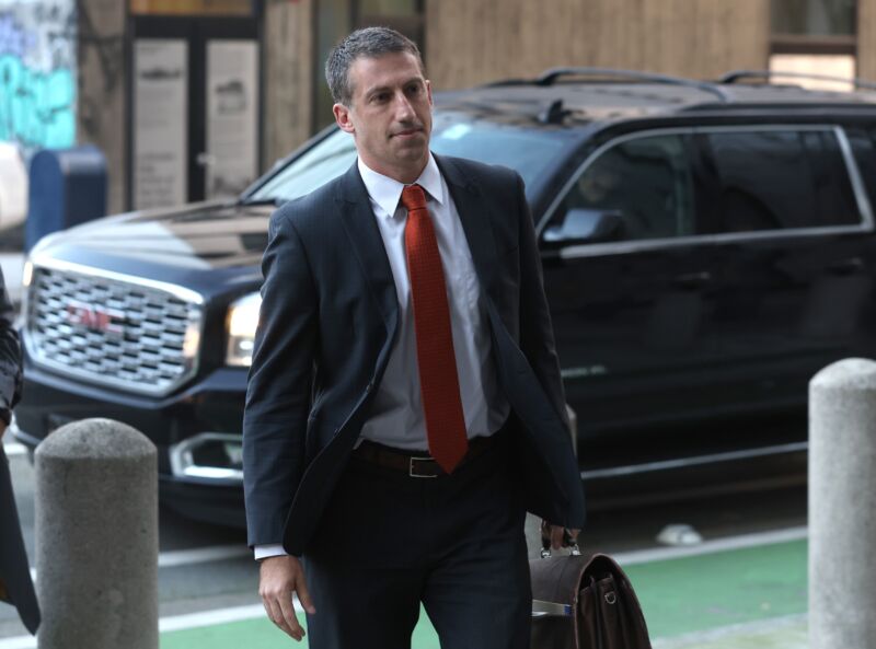 Elon Musk's lawyer Alex Spiro seen walking toward a courthouse.