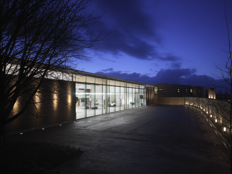 A high wall keeps prying eyes from seeing what Aston Martin's design studio is working on.