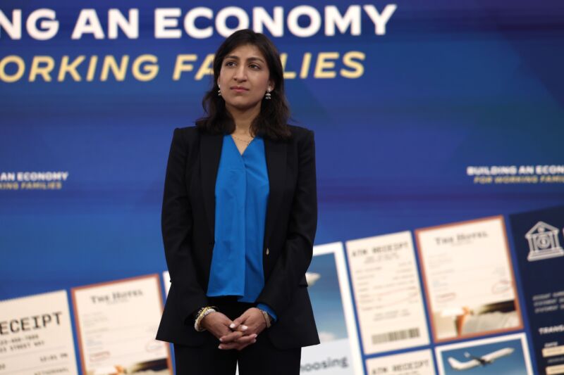 Federal Trade Commission Chair Lina Khan standing on a stage.