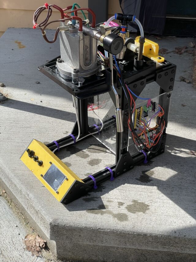 Norm Sohl's DIY open source espresso maker. There's no drip tray yet, and a bit too much wiring and heat exposed, but it pulls shots.