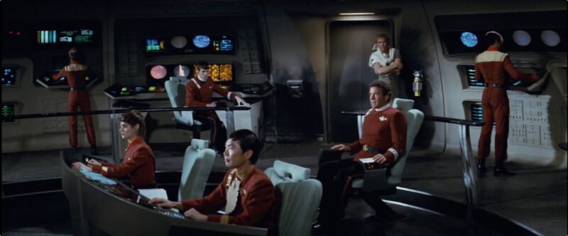 The crew of the <em>Enterprise</em> in <em>Star Trek II: The Wrath of Khan</em>, a film with many references to Starfleet Academy.”><figcaption class=