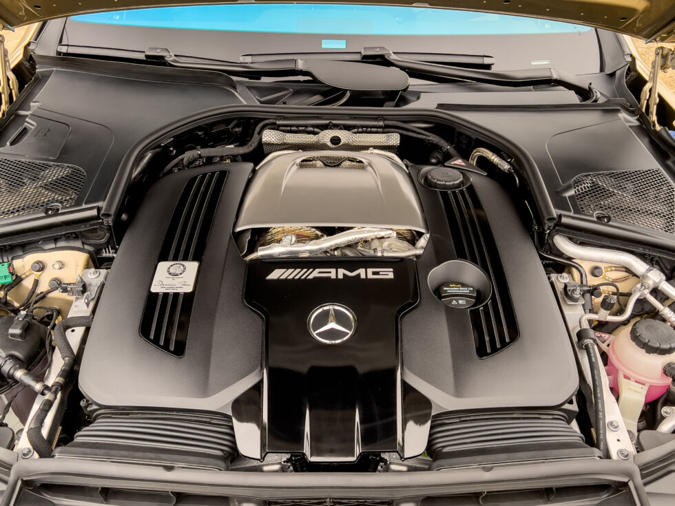 In the old days, engine bays were interesting to look at, but now they just cover everything in plastic cladding.