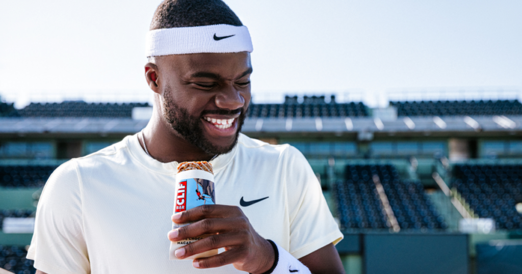 Tennis star Frances Tiafoe eats a Clif bar