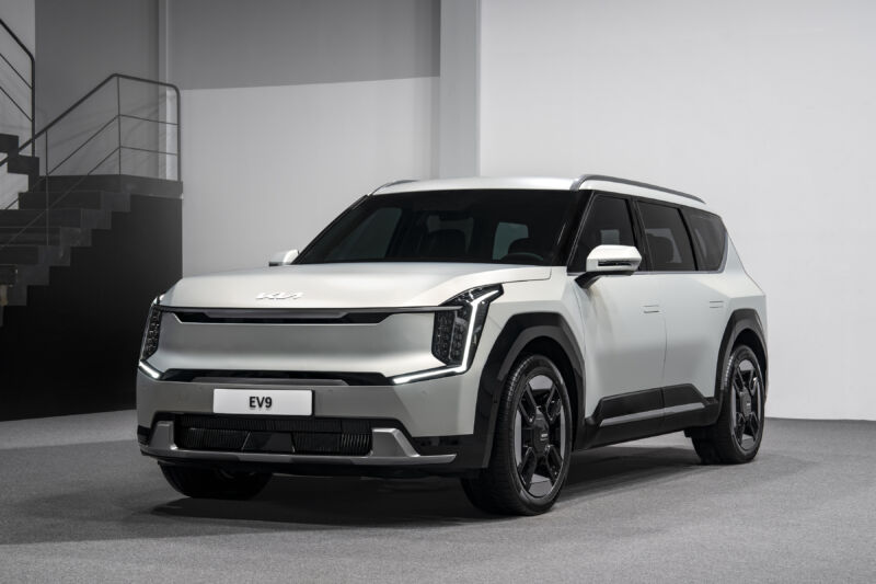 A prototype Kia EV9 SUV in a studio