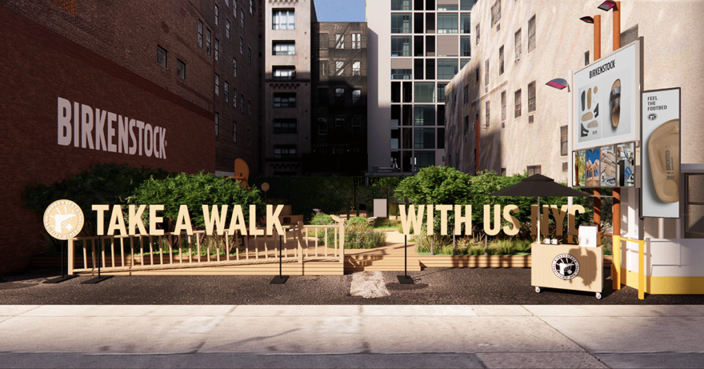 a small park in new york city with platforms and a sign that says "take a walk with us nyc"