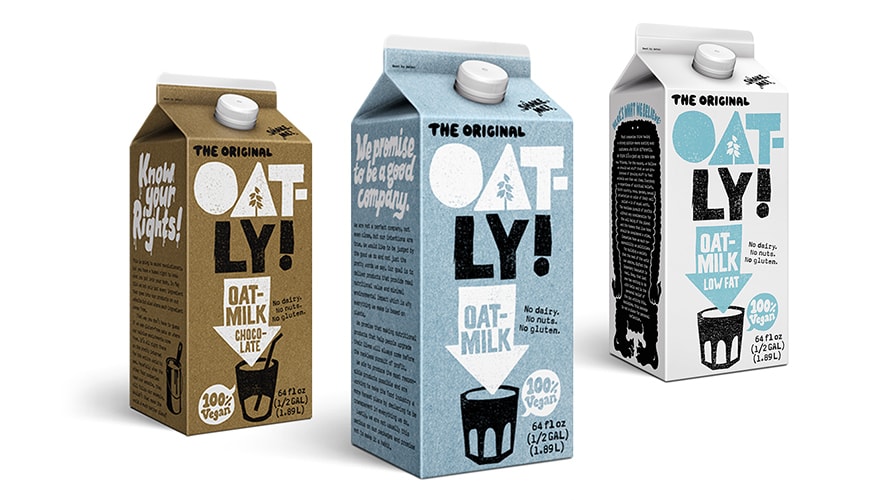 three bottles of oatly oat milk