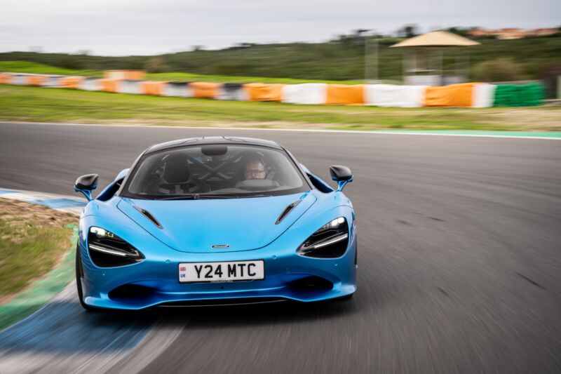 A blue McLaren 750S seen head-on