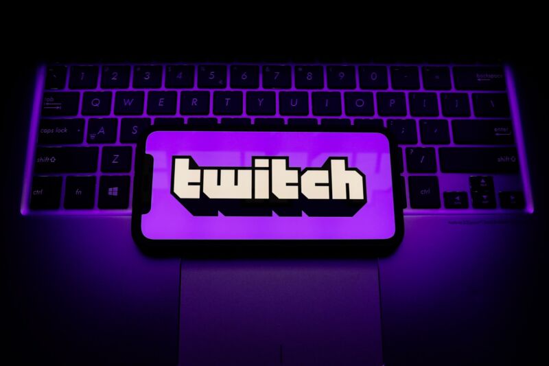 Twitch logo displayed on a phone screen.