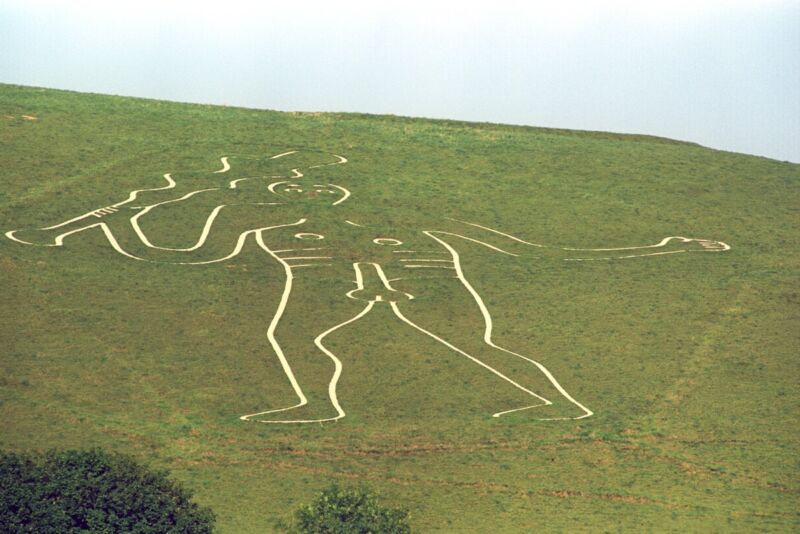 Behold, the "Rude Man" chalk giant carved on a hill above the village of Cerne Abbas in Dorset, England.