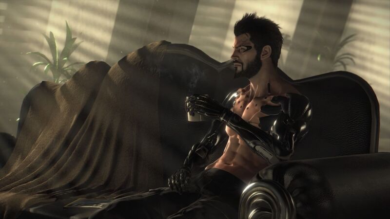 Adam Jensen of Deus Ex: Mankind Divided, having coffee on the couch in diffuse sunlight