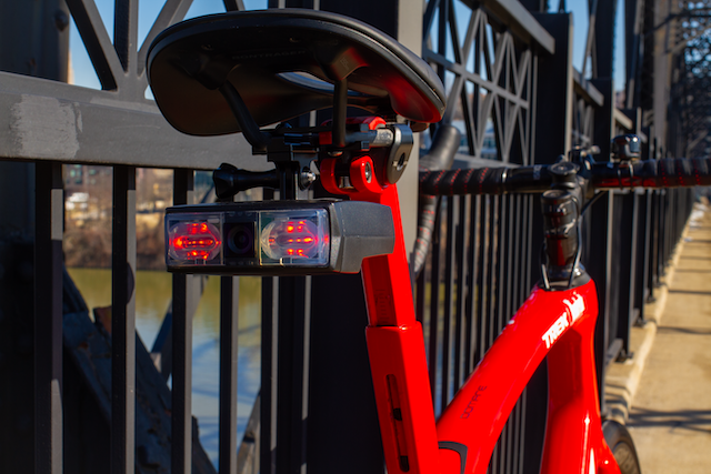 Copilot mounted to the rear of a road bike