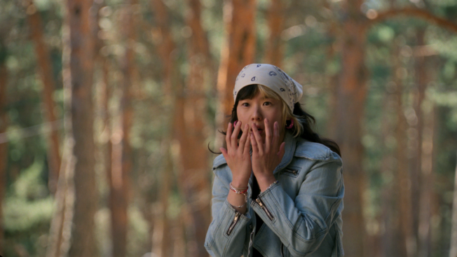 A woman screaming in the forest