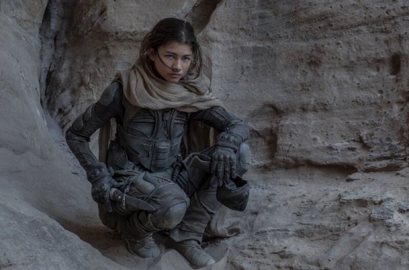 shot of Fremen woman in a stillsuit kneeling