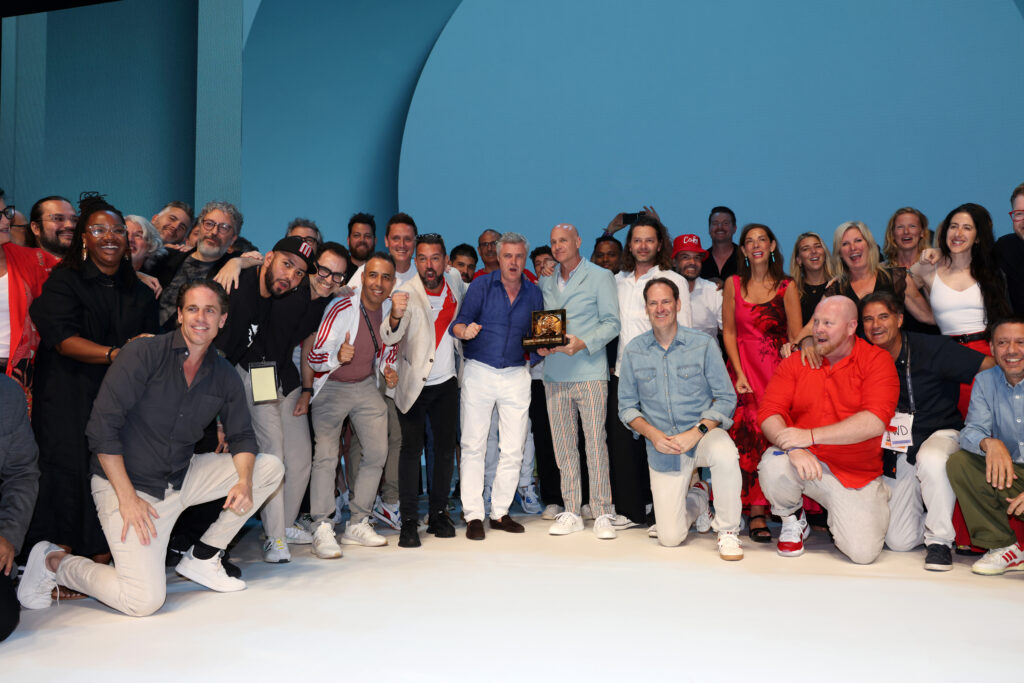 wpp employees holding their cannes lions award