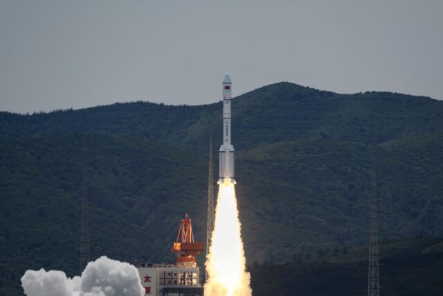 A Long March 6A rocket launches the first 18 Internet satellites for China's Qianfan, or Thousand Sails, broadband network.