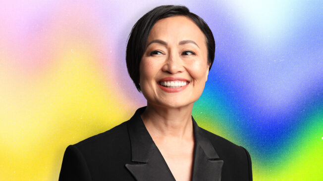 Headshot of Sheila Lirio Marcelo smiling with a rainbow gradient background.