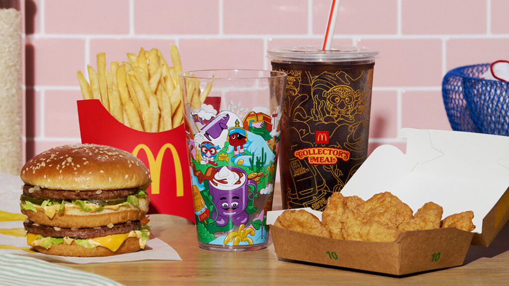 A Big Mac, fries, chicken McNuggets, cola and collectible cup.