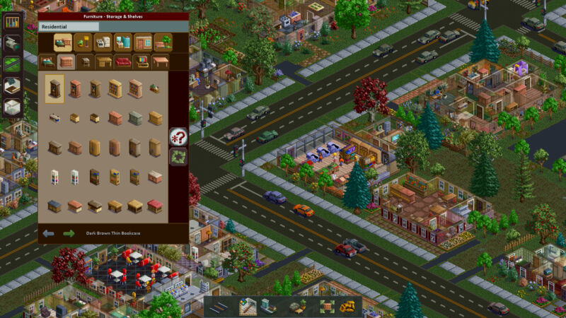 Designing the pieces of a house in Metropolis 1998, with a series of bookshelves and couches open in the menu picker on-screen.