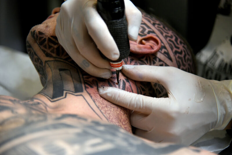 BARCELONA, SPAIN - 2021/10/02: Spanish tattoo artist Oscar Garcia works on a man, during the Expo.
Fira de Barcelona hosts the XXIV edition of the Barcelona Tattoo Expo where tattoo artists from Spain and other countries exhibit tattoos and tattoo material such as ink, needles and special machinery for tattoo work. (Photo by Ramon Costa/SOPA Images/LightRocket via Getty Images)