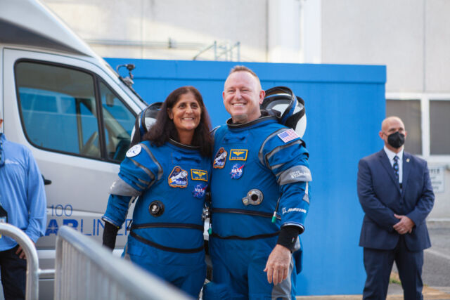 NASA astronauts Suni Williams and Butch Wilmore, seen in their Boeing flight suits before their launch.